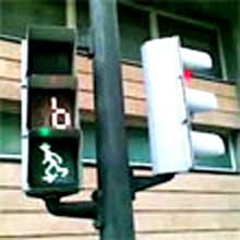 Pedestrian traffic lights with a countdown and a small animated stick figure